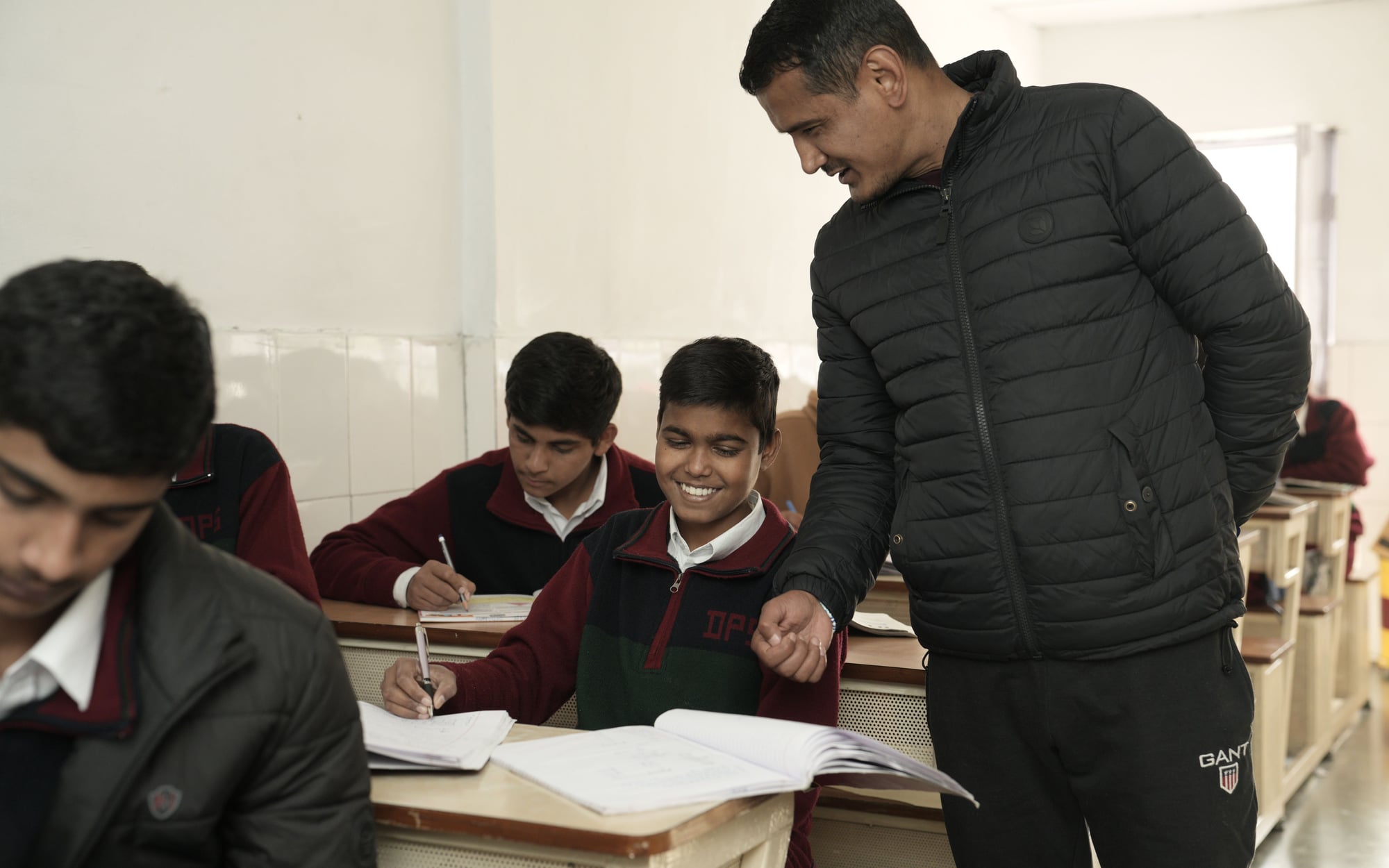 A teacher with students in a Dalhousie classroom